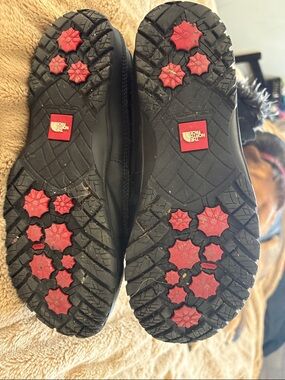 The North Face Black Winter Lace-Up Boots with Red Outsole Accents